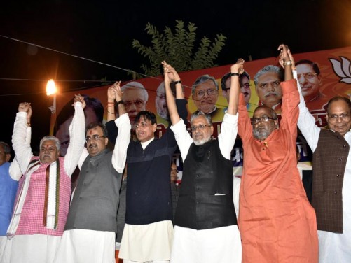 Patna-Dec.2,2016-Newly appointed Bihar BJP president Nityanand Rai is joining hand with senior BJP leader Sushil Kumar Modi and others at party office in Patna. Photo by  Sonu Kishan.